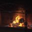 Warm slow motion fireplace buring during winter